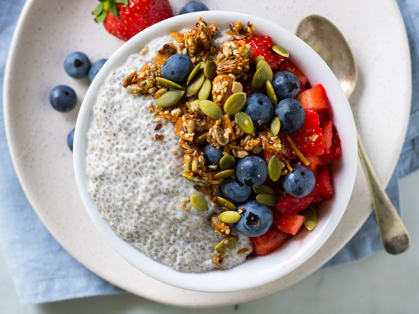 A simple vanilla chia pudding served up with fresh berries and crunchy granola!