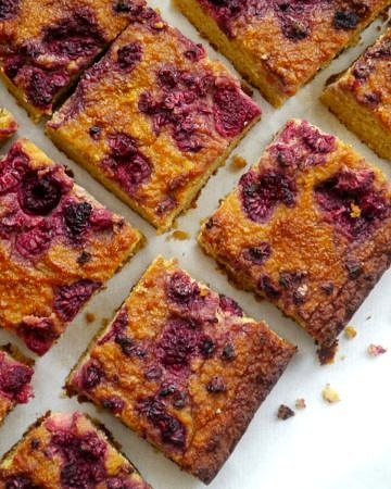 Orange, Almond and Raspberry Cake - gluten free, grain free, dairy free - it's paleo friendly! Recipe via Nourish Everyday