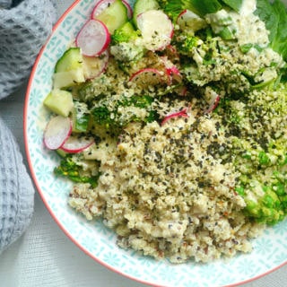 Plant-based protein bowl with greens, quinoa and mixed seeds