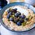 Healthy Carrot Cake Oat Porridge by Nourish Everyday - This easy, delicious porridge recipe combines gluten free oats, grated carrot and fragrant spices to make a healthy breakfast that tastes like dessert!