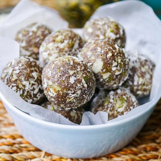 Apricot Cashew and Pumpkin Seed Bliss Balls by Nourish Everyday | Tasty, chewy and nutritious bliss balls made with natural dried apricots, cashews and crunchy pumpkin seeds. Gluten free, dairy free, no added sugar!