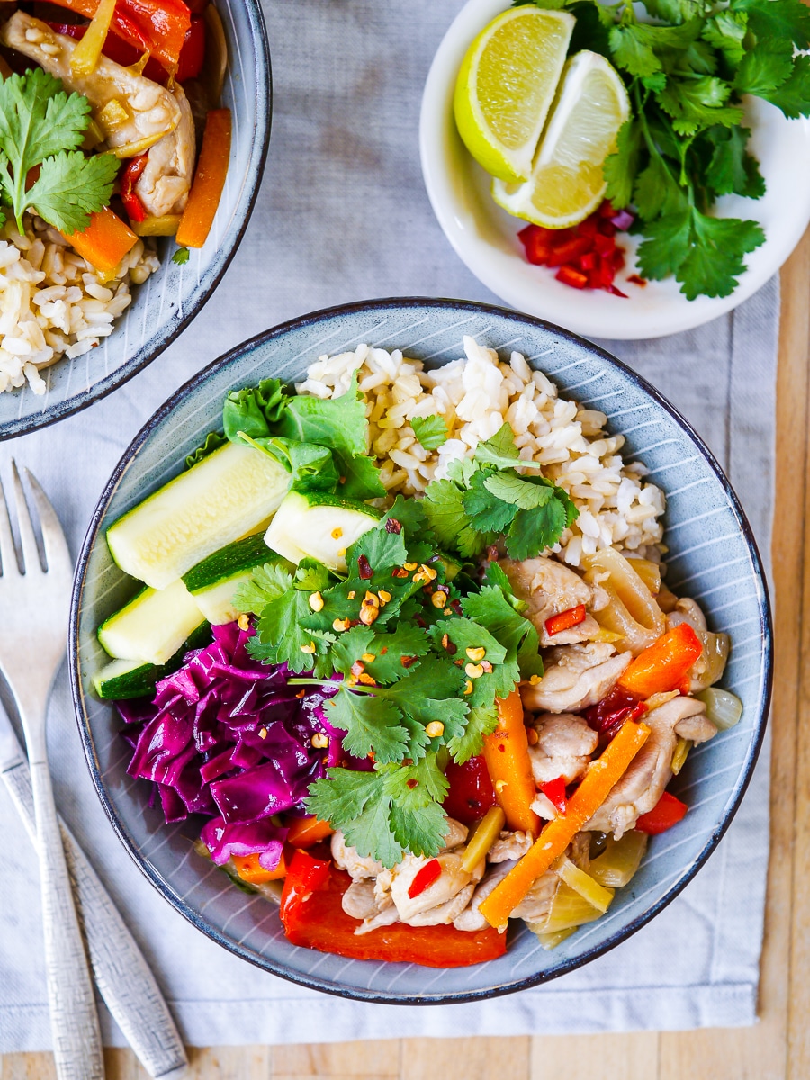 Ginger Chilli Chicken Rice Bowls made with natural real food ingredients, just like takeaway but BETTER. Gluten free, dairy free and low in sugar. An easy healthy dinner that the whole family will love!