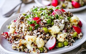 This gorgeous pea and cauliflower quinoa pilaf is packed full of healthy vegetables. Vegan, gluten free and sugar free. The perfect side dish! Recipe via wordpress-6440-15949-223058.cloudwaysapps.com