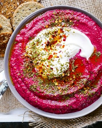 Dairy free Beetroot Lentil Dip recipe. Easy to make, bright, healthy and delicious! A great healthy appetiser or snack that's gluten free and vegan. Recipe via wordpress-6440-15949-223058.cloudwaysapps.com