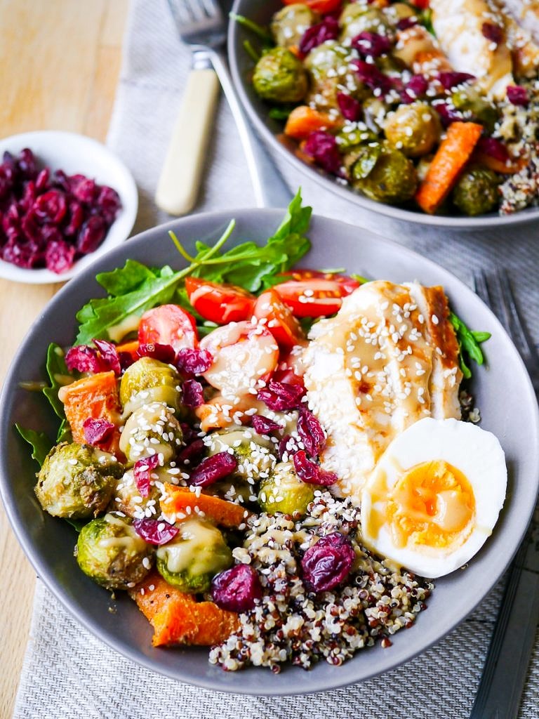 This healthy Maple Tahini Brussels Sprouts Quinoa Bowl is a delicious grain bowl packed with vegetable goodness! Dairy free, gluten free & nut free, with a vegan or vegetarian option.