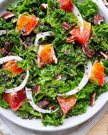 A vibrant, healthy massaged kale and blood orange salad. Finished with crunchy pecans! Gluten free, dairy free and vegan friendly. Recipe via wordpress-6440-15949-223058.cloudwaysapps.com