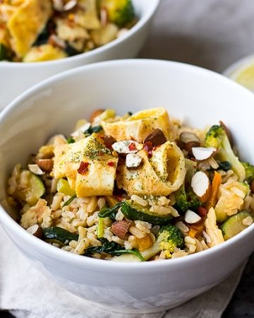 Miso Fried Rice with Egg and Greens is a healthy balanced meal that's super easy and super satisfying. Gluten free, dairy free but full of flavour! A great weeknight dinner.