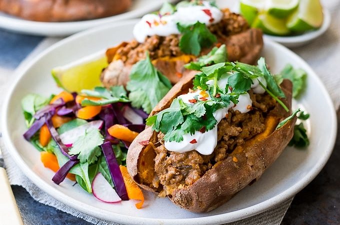 Thai Red Curry Stuffed Sweet Potatoes {gluten free, grain free, dairy free, paleo, nut free} - recipe by Nourish Everyday