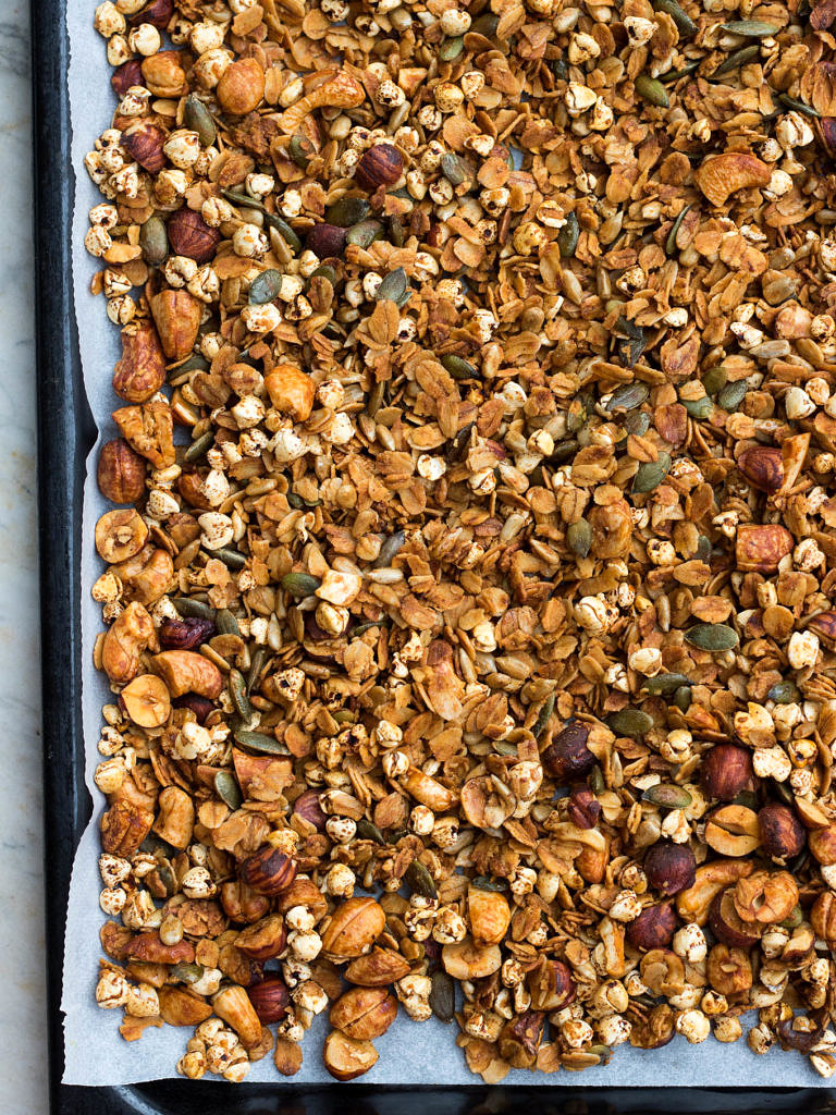 Crisp honey olive oil granola made with simple pantry ingredients. All natural, low sugar, plus it's gluten free and dairy free! An easy healthy breakfast.