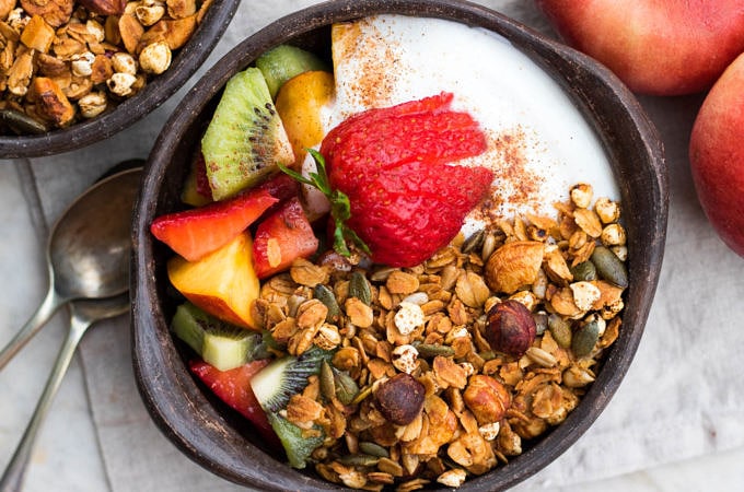 Crisp honey olive oil granola made with simple pantry ingredients. All natural, low sugar, plus it's gluten free and dairy free! An easy healthy breakfast.