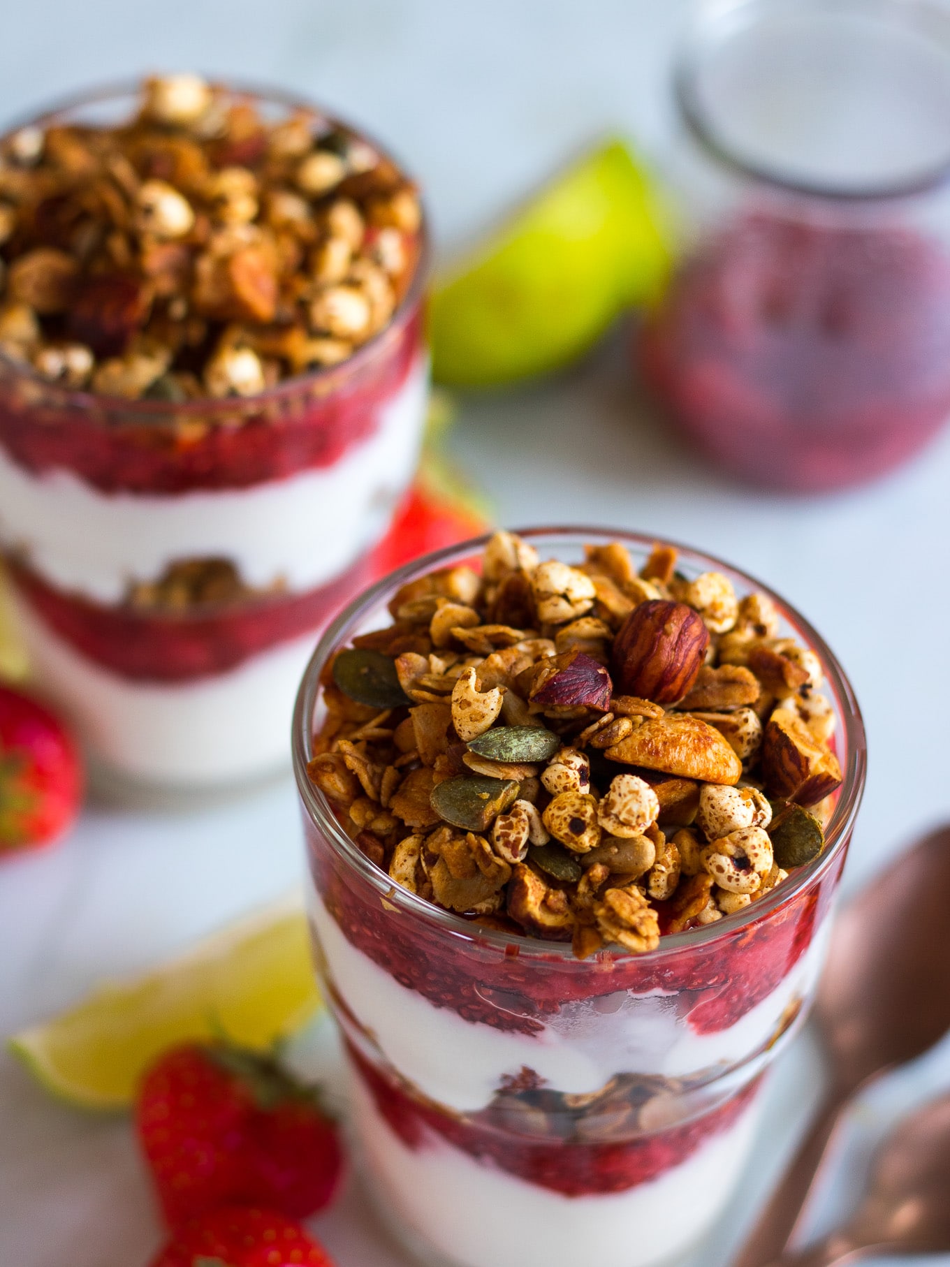 Strawberry Lime Chia Yoghurt Parfaits make a beautiful but simple breakfast, snack or even a healthy dessert! They're perfect to meal prep and can be made gluten free and dairy free too. #glutenfree #yoghurtparfait