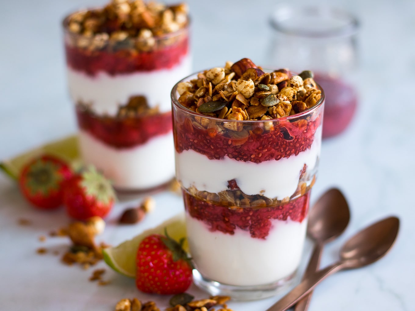 Strawberry Lime Chia Yoghurt Parfaits make a beautiful but simple breakfast, snack or even a healthy dessert! They're perfect to meal prep and can be made gluten free and dairy free too.