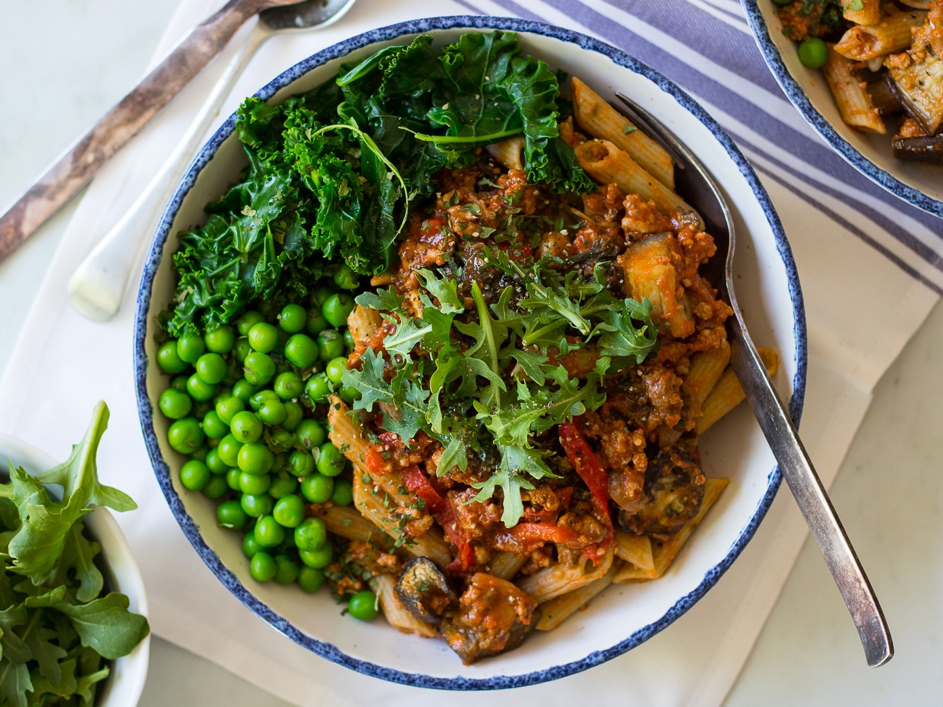Roast Eggplant and Kale Bolognese - a healthy bolognese sauce made gluten free and dairy free. Served here over gluten free pasta, you could also go paleo and use vegetable noodles like zoodles.