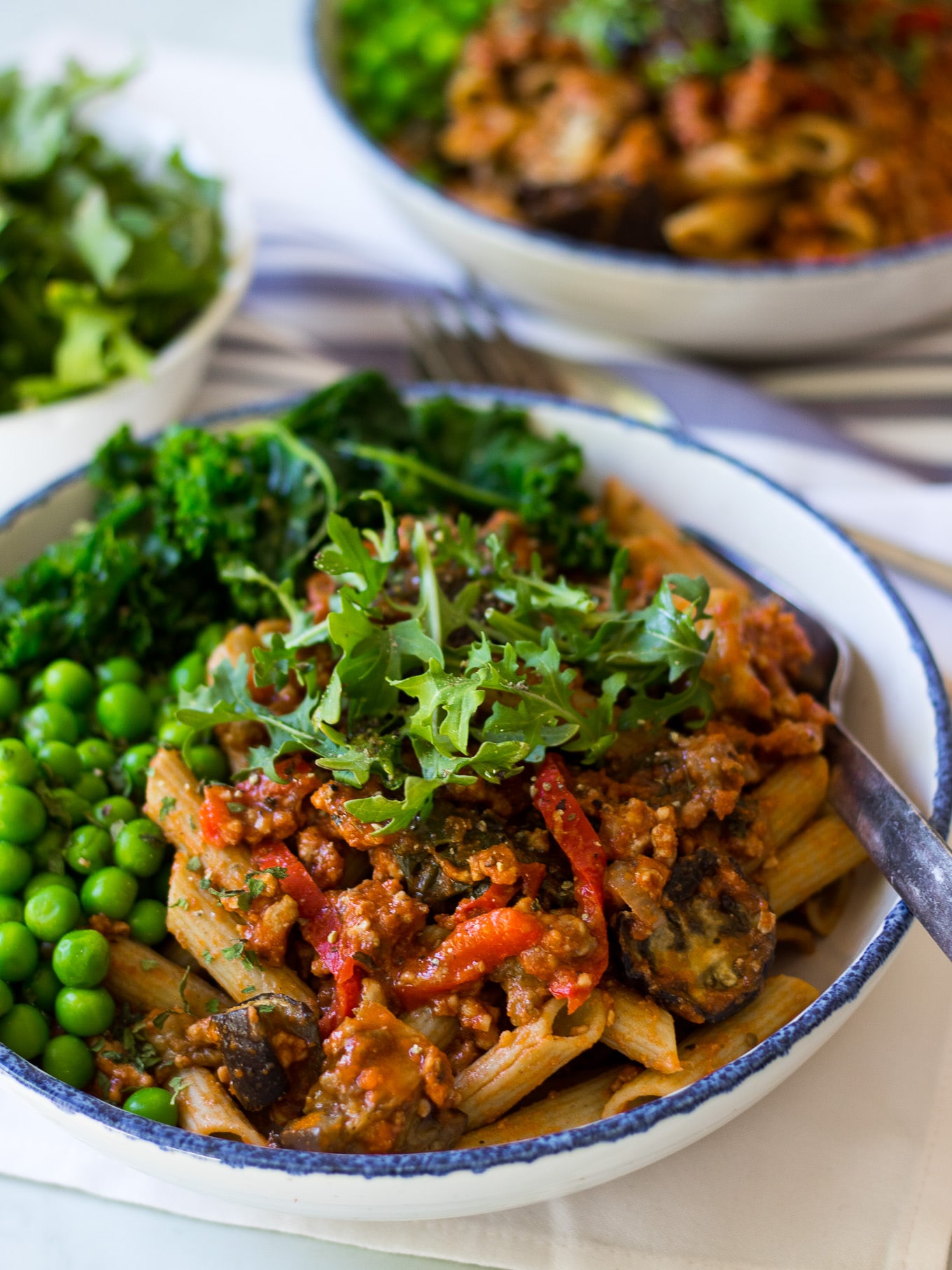 Roast Eggplant and Kale Bolognese is a hearty, healthy meal that's easy to prepare and freezes well too. Gluten free and dairy free, a great sauce over gluten free pasta or spiralised veg for a #paleo option. #healthybolognese #glutenfreepasta