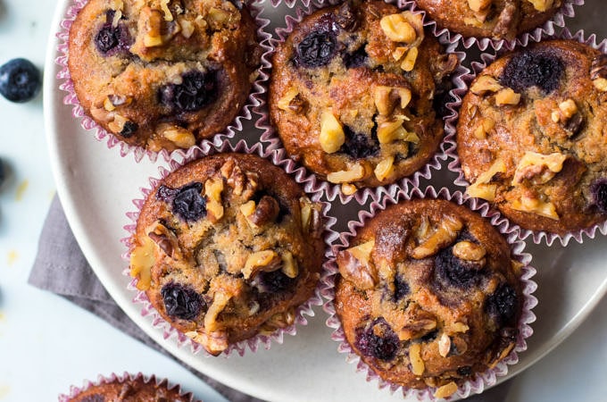 Healthy Blueberry Cinnamon Muffins on white plate