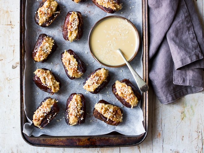 Coconut tahini stuffed dates on baking tray