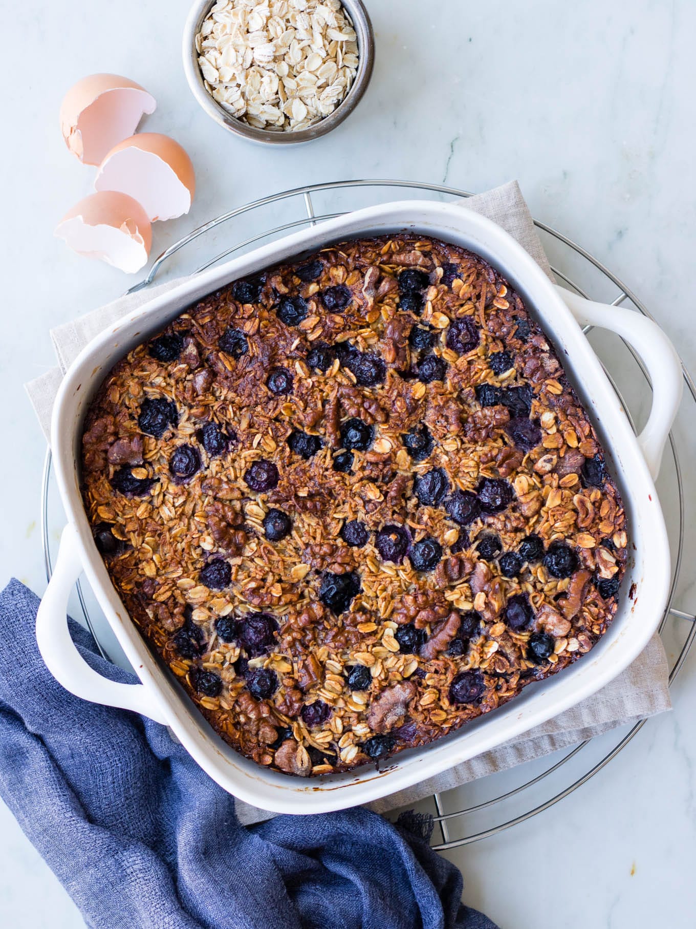 coconut blueberry baked oats in square baking dish