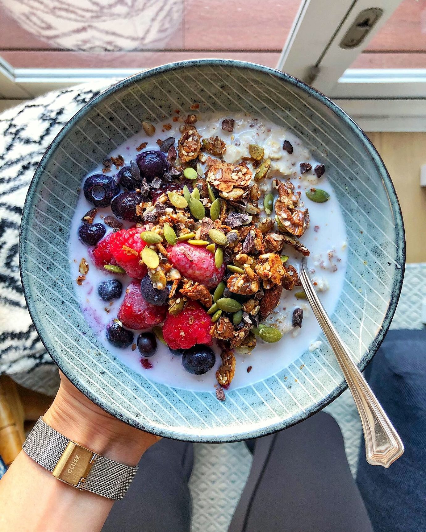 Granola bowl with fruit and fortified plant milk by Nourish Every Day