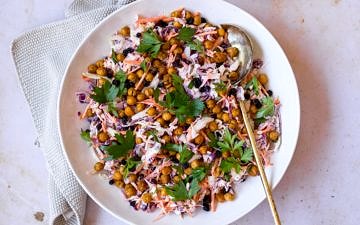 Healthy yoghurt coleslaw topped with roasted chickpeas main shot