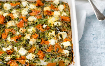 Sweet potato, broccoli and feta frittata in a white rectangular baking dish
