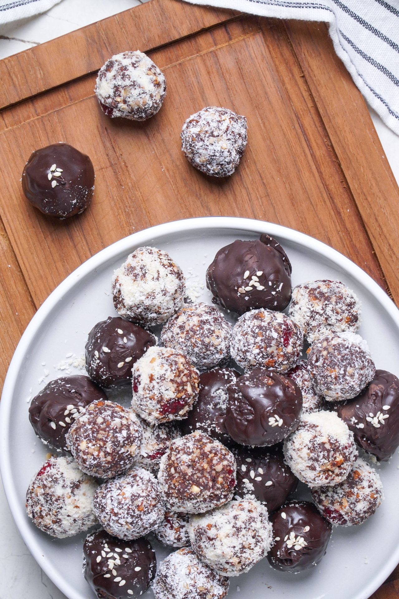 Bliss ball truffles close up image - made with dates, cacao, mixed nuts, desiccated coconut