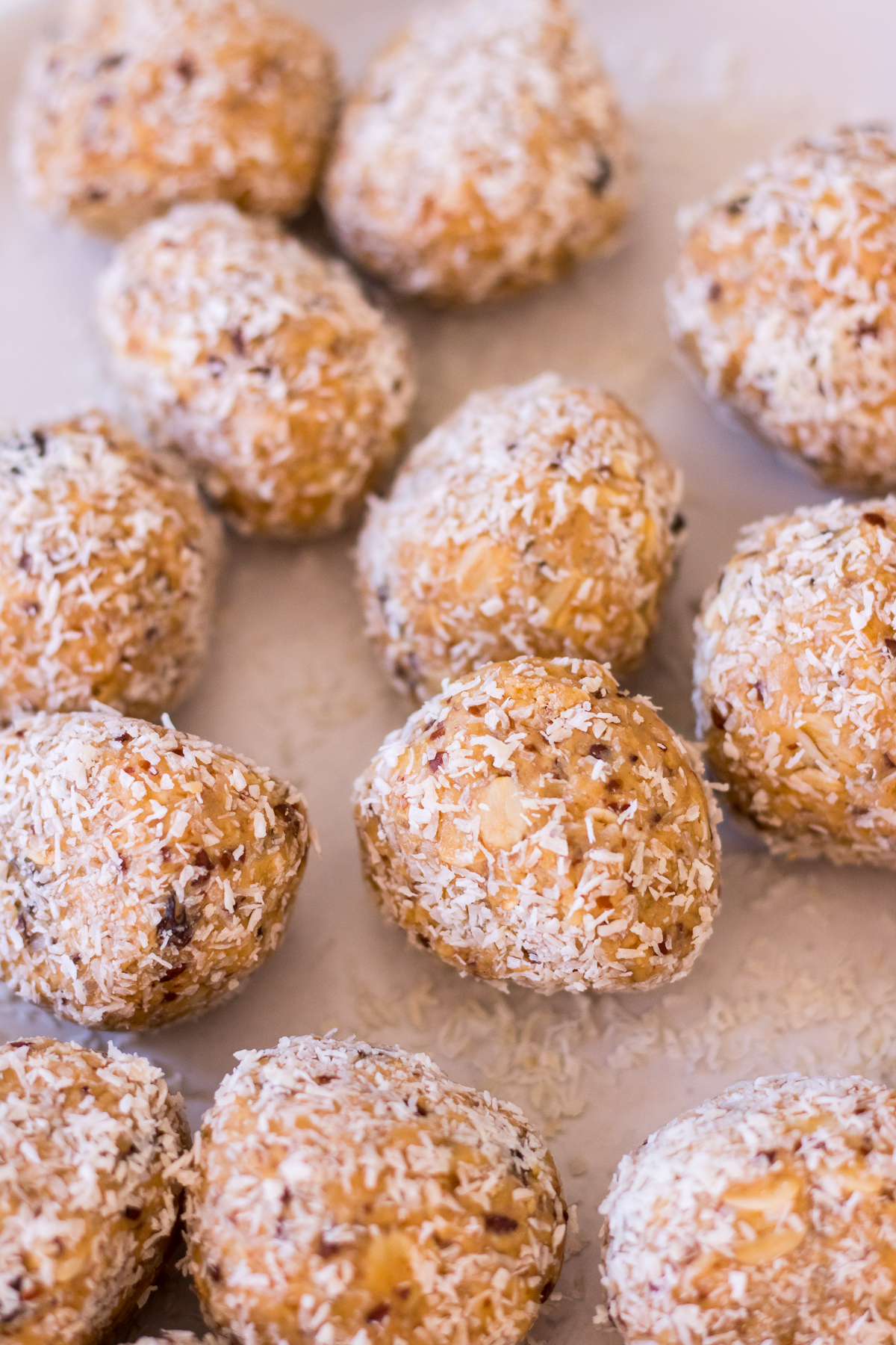 An image of energy balls coated in desiccated coconut