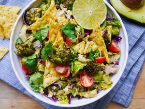 Vegan friendly Roasted Broccoli and Guacamole Salad | wordpress-6440-15949-223058.cloudwaysapps.com | all the goodness of a big green salad mixed with lots of avocado and lime, so easy and delicious!