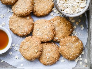 This easy buckwheat ANZAC cookies recipe is gluten free, dairy free and nut free. A simple vegan cookie with that classic combo of oats and coconut! Recipe by Nourish Everyday