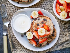 These Vegan Chocolate Chip Banana Pancakes are made gluten free with buckwheat flour, and only naturally sweetened. A healthy but indulgent breakfast!